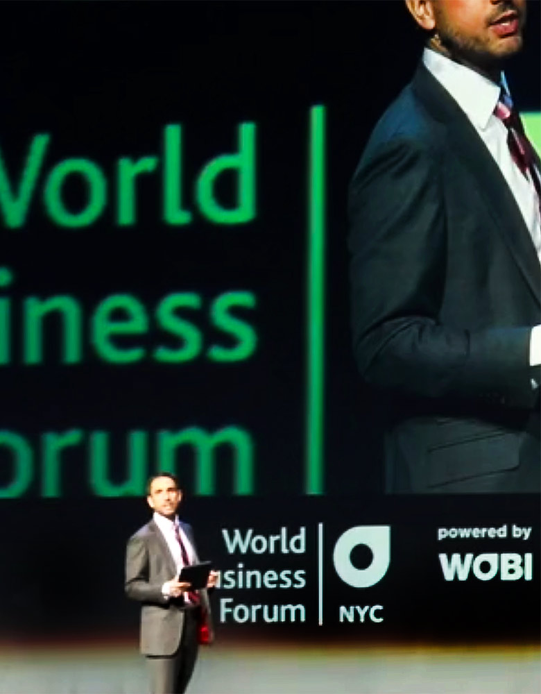 Event photography NYC — speaker on stage at the World Business Forum