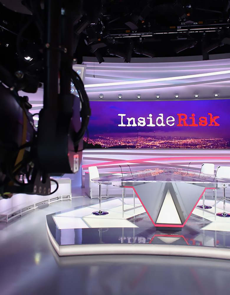 Video production — Inside Risk television studio news set