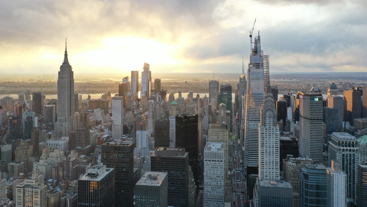 Aerial photography NYC — Manhattan skyline with the Empire State Building at sunset