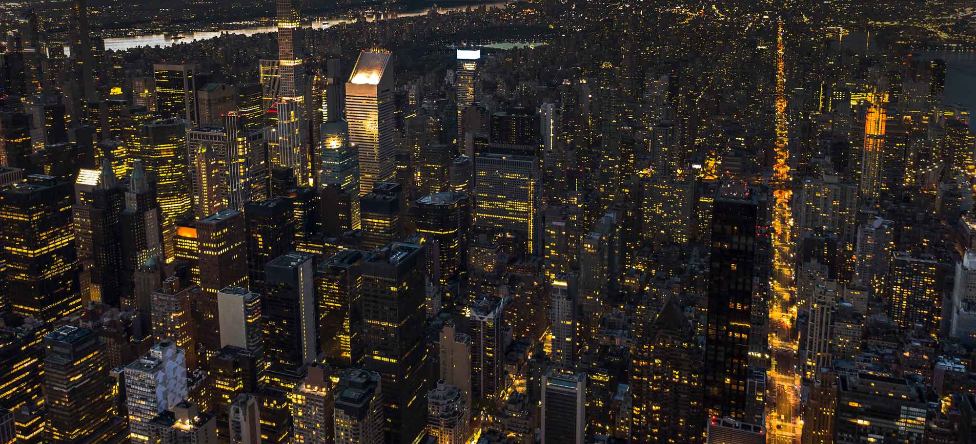 Aerial photography NYC — Manhattan skyline panorama at night